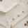 Wickelbody mit Himbeeren, beige